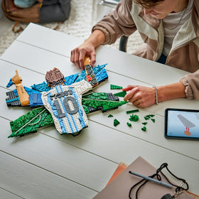 LEGO Lionel Messi sky and pitch backdrop adds texture to room decor.