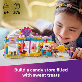 LEGO Friends candy store interior features a colorful counter for pretend shopping.