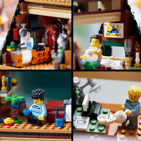 LEGO Ideas A-Frame Cabin three buildable trees and a canoe for scene setting.