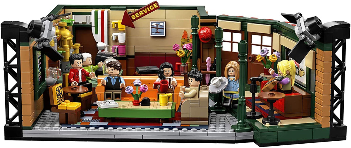 Seven minifigures including Ross, Rachel, Chandler, Monica, Joey, Phoebe, Gunther ready for scenes