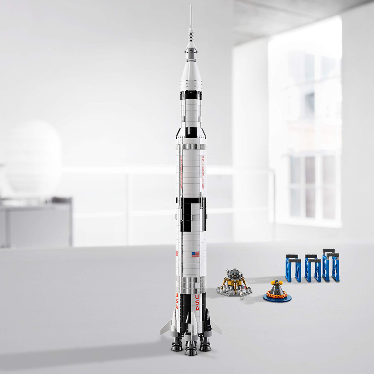 LEGO Ideas Apollo Saturn V display stand with booklet for context