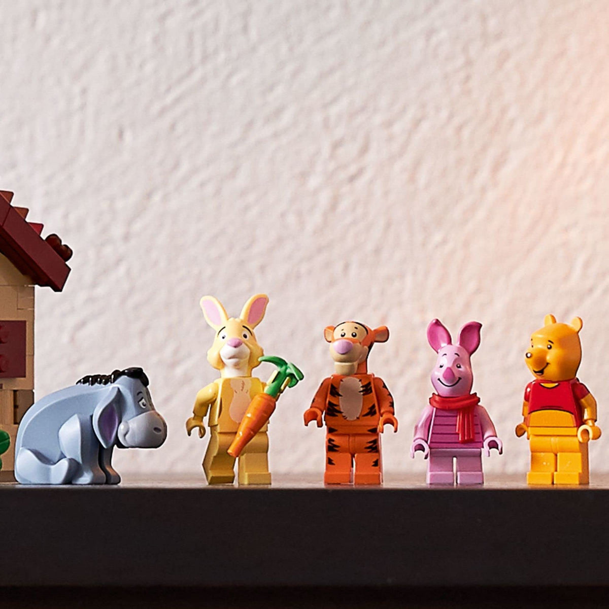 LEGO Ideas Pooh armchair build inside, showcases cozy interior details.