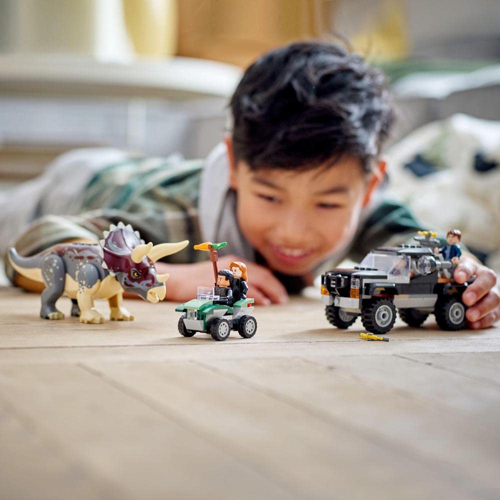 LEGO Jurassic World Triceratops Truck Attack escape quad with minifigures for imaginative adventures.