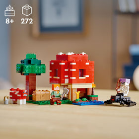 LEGO Minecraft The Mushroom House roof removed reveals interior crafting table and furniture.