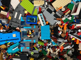 LEGO random pieces and bricks in a mixed collection for family projects.