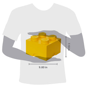 LEGO Room Copenhagen yellow brick drawer opened to reveal bricks.