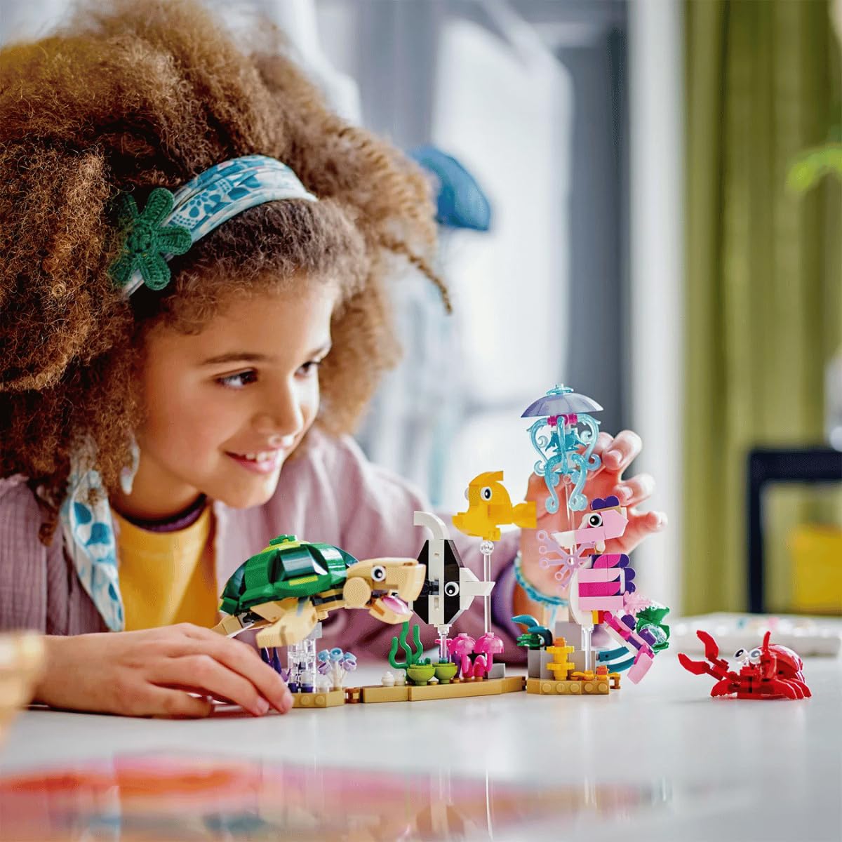 LEGO Sea Animals seabed plants and coral accents enhance aquarium-like display.