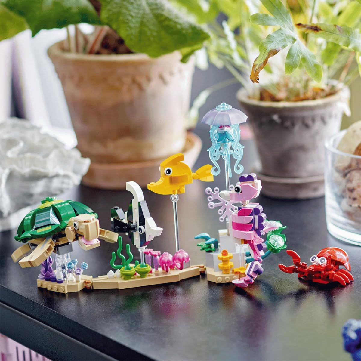 LEGO Sea Animals two fish on plants scene emphasizes movement and colorful habitat.