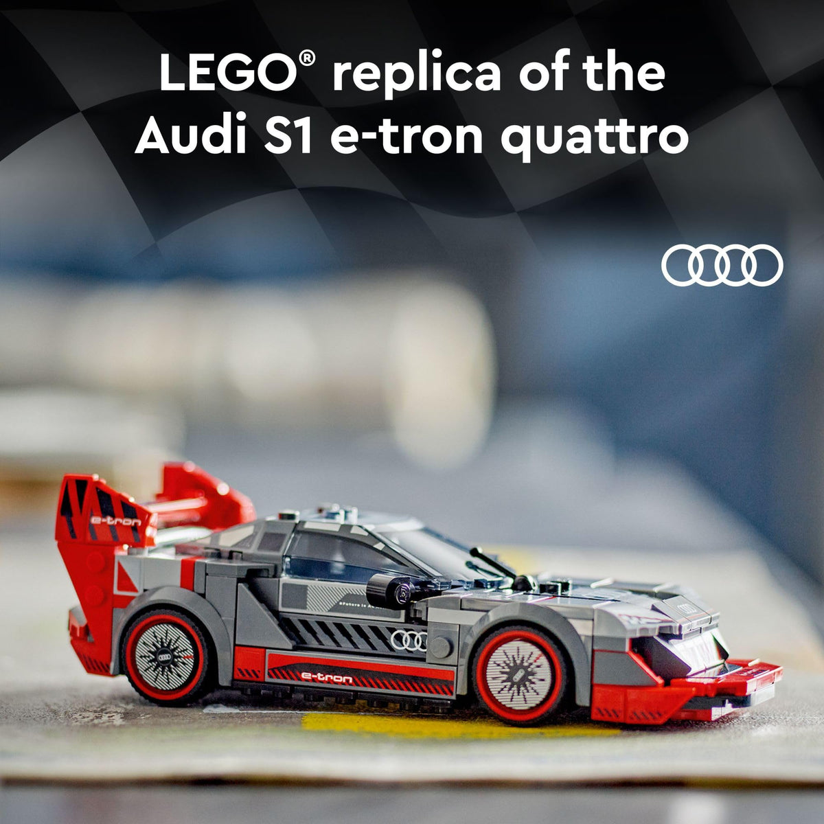 Rear diffuser and wing detail on the Audi model for enthusiasts.