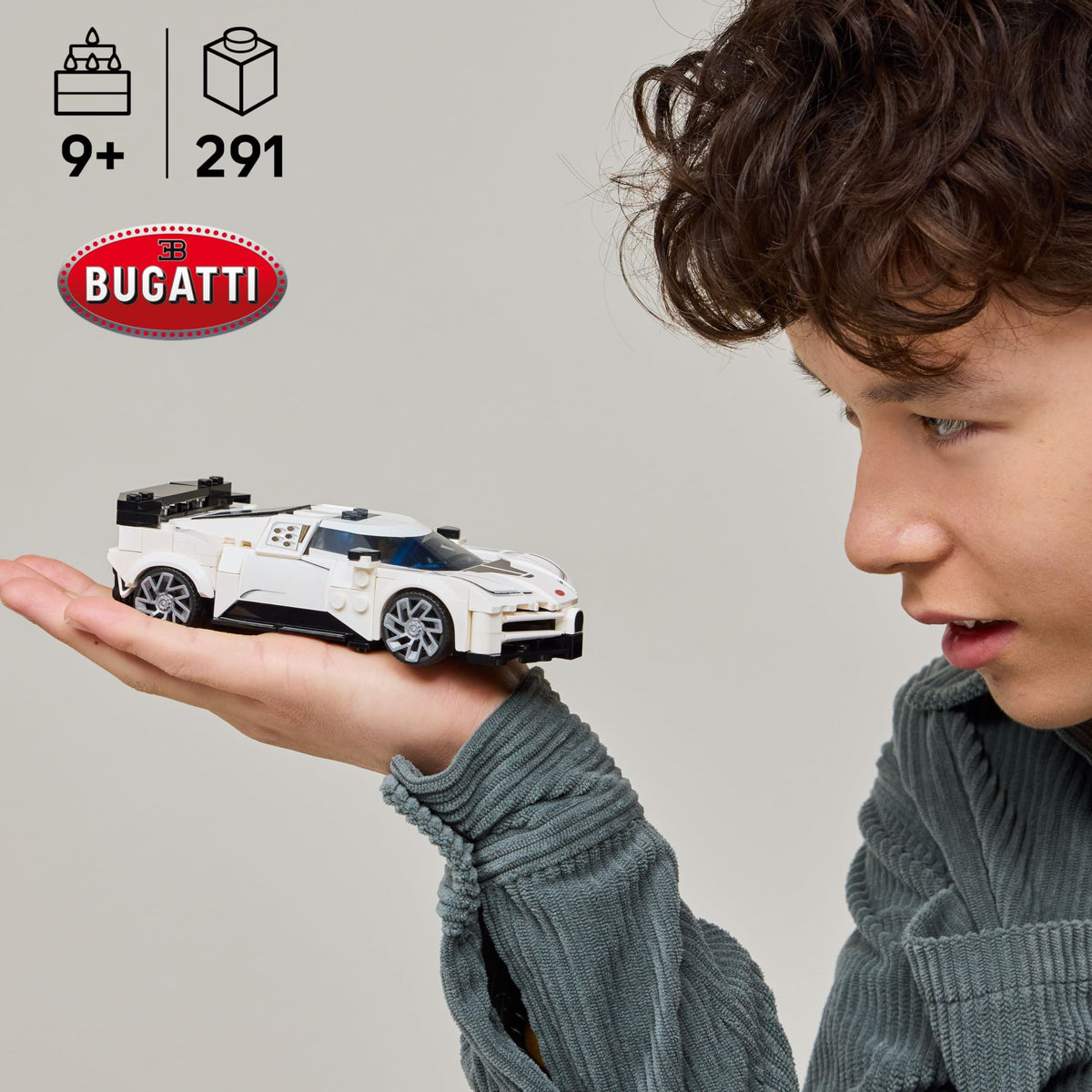 Driver minifigure in racing gear included for immersive pretend races.