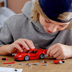 Ferrari driver minifigure included for racing storytelling