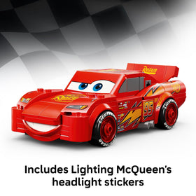 Display scene featuring Lightning McQueen on a shelf or desk.