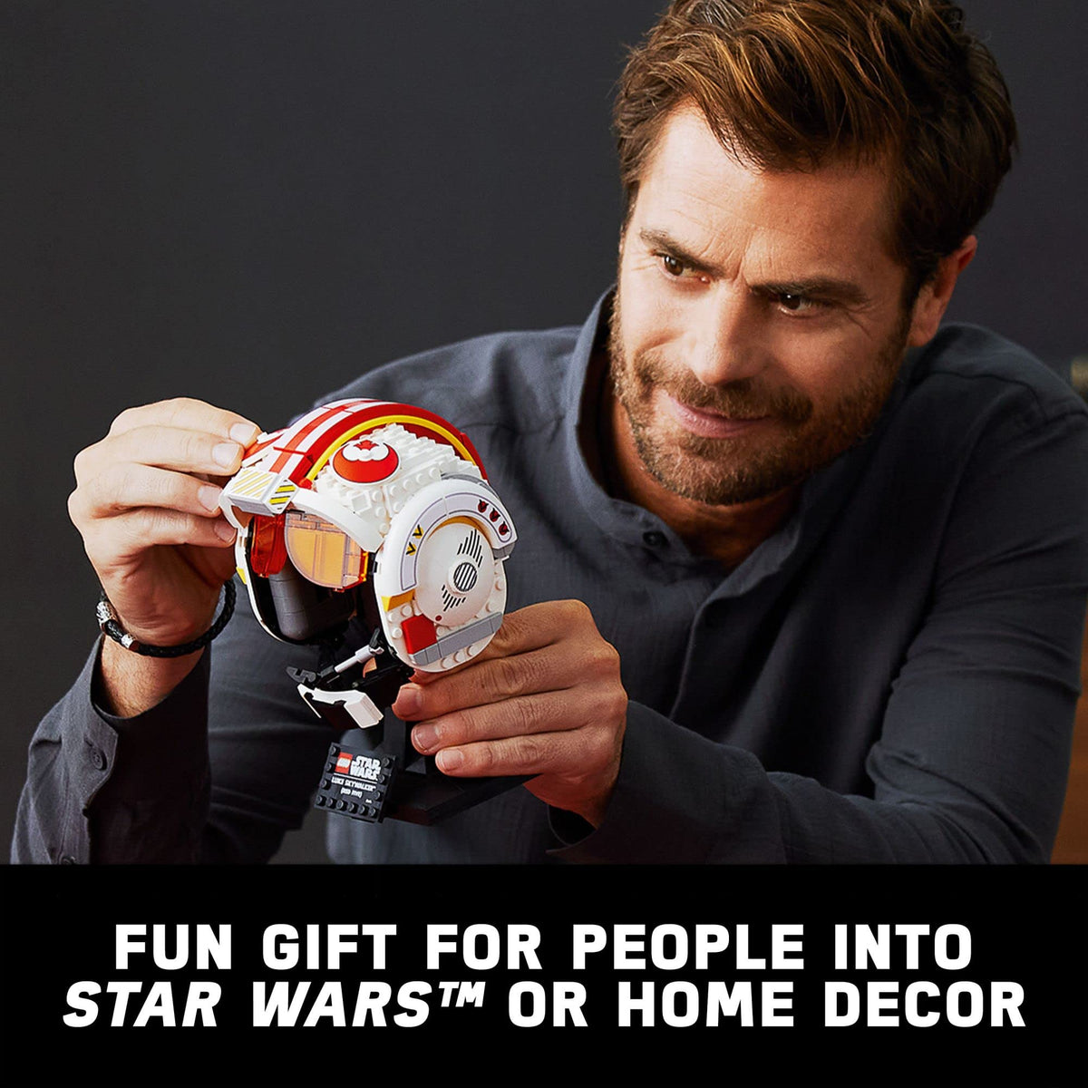 LEGO Luke Skywalker Red Five helmet display on shelf.