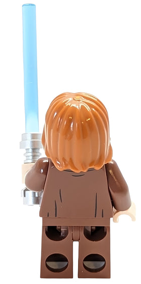 LEGO Obi-Wan Kenobi mini figure close-up shows detailed print and saber