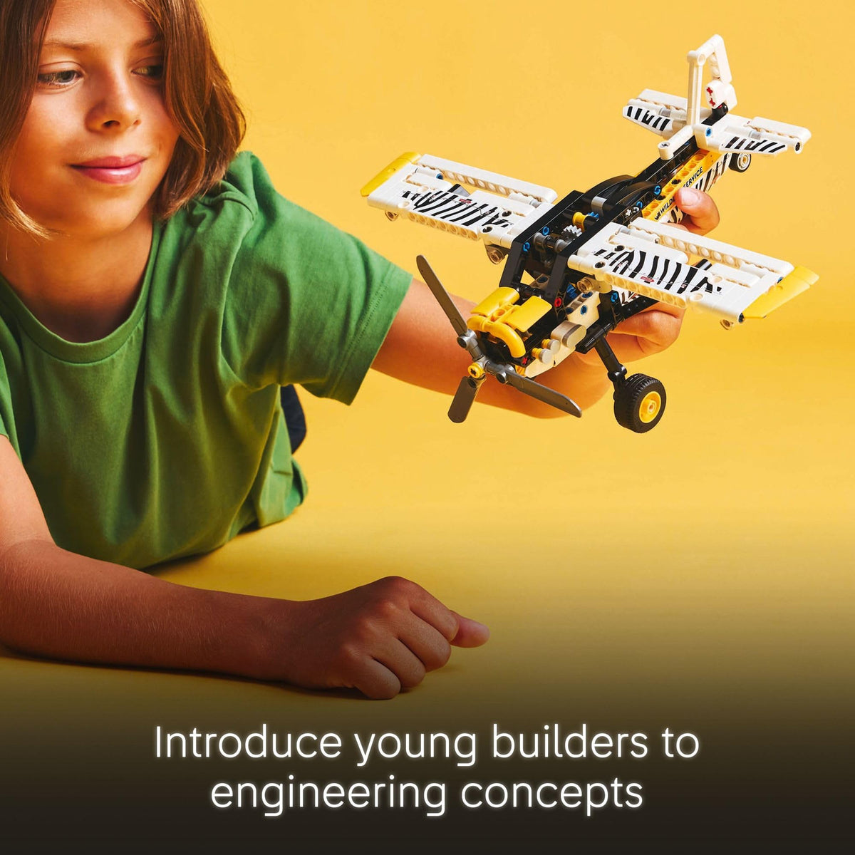 LEGO Technic Bush Plane engine cover opens to reveal piston mechanism details.