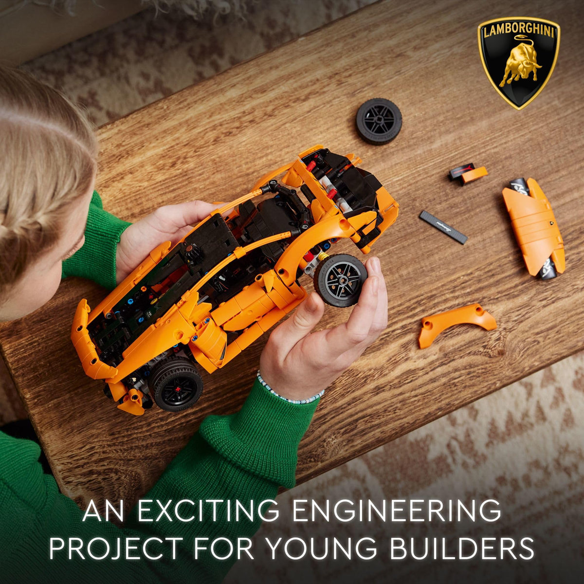 LEGO Technic Lamborghini Huracan Tecnica orange model on display in kids' rooms.