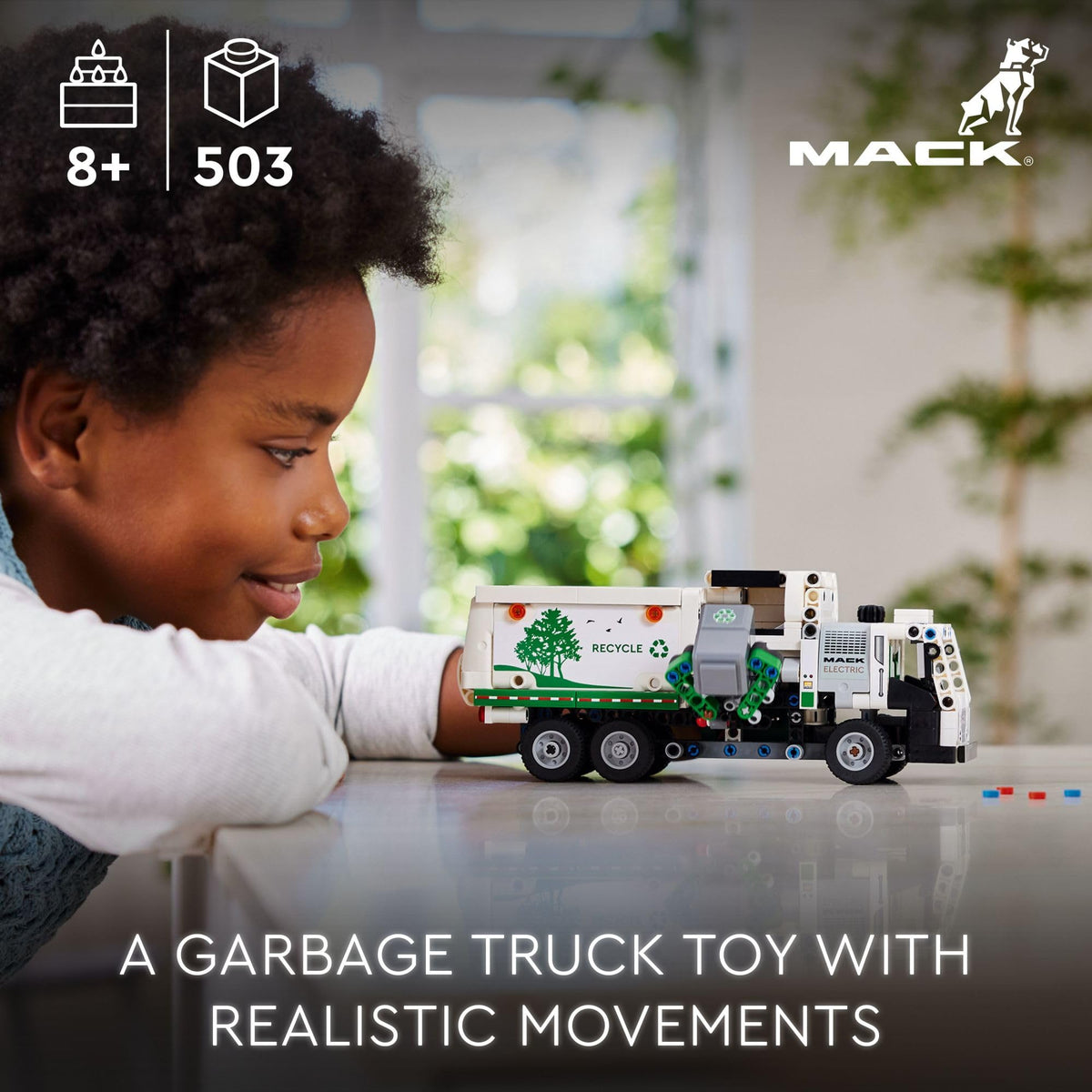 LEGO Technic Mack LR cab doors opening to reveal the driver's seat during imaginative play.