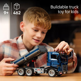LEGO Technic tipping dump truck cab interior reveals detailed controls for hands-on role-play.