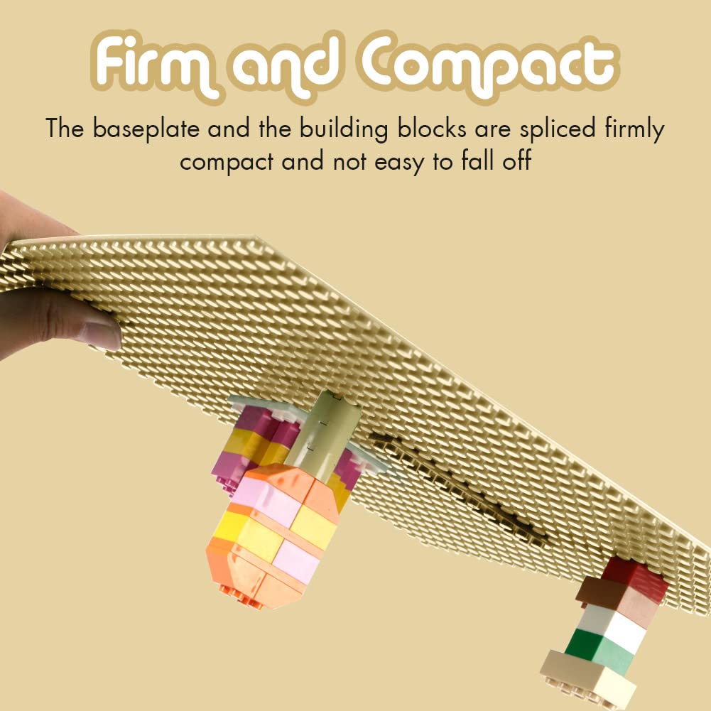 Lekebaby grey baseplates reinforce multi-level structures on the table.