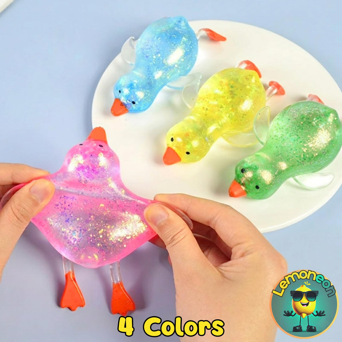 Lemoneon Glitter Duck Squishy pink offers soft texture and fun display.