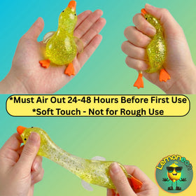 Lemoneon Glitter Duck Squishy yellow provides slow-rebound squeeze and cheer.