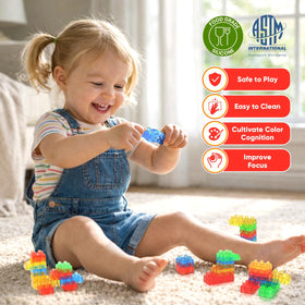 Lesong squeezable silicone blocks stacked for imaginative construction play.