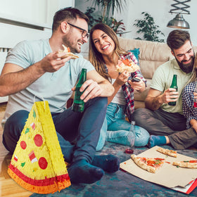 Lewtemi Pizza Piñata table decor enhances pizza-themed party ambiance.