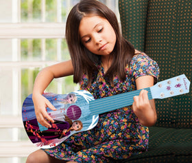 LEXiBOOK Frozen first guitar blue packaging, ready for gifting and presentation.
