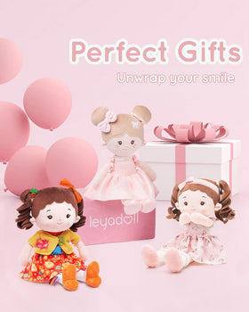 LeyaDoll Busy Doll button play promotes fine motor exploration.