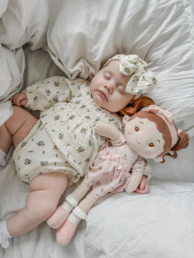LeyaDoll 16-inch doll in a cozy reading nook scene for bonding moments