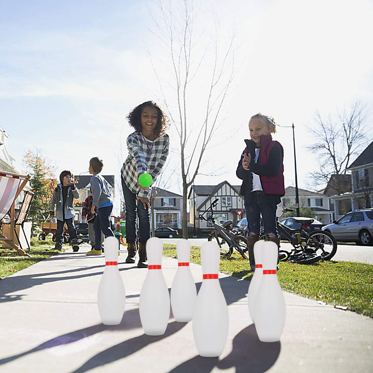 Liberry kids bowling set in action during a sunny outdoor session.