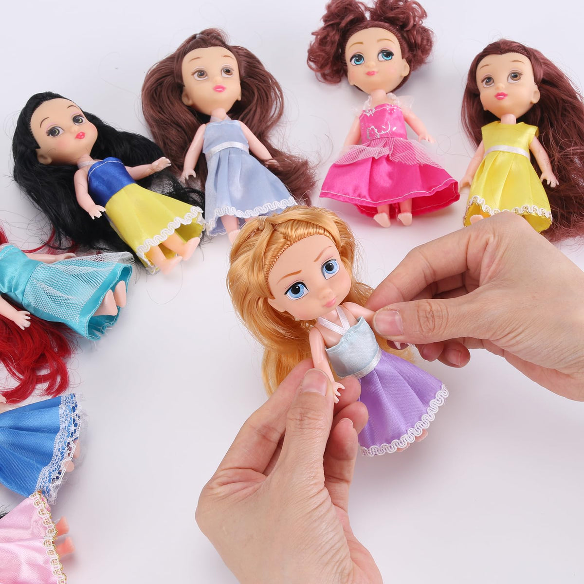 Liberty Imports removable dresses and accessories for mix-and-match princess play.