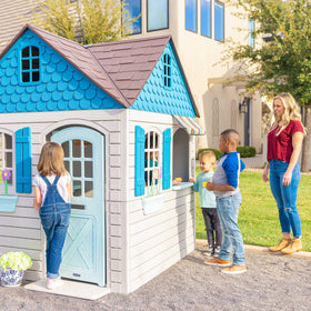 Lifetime Playhouse storefront-windows-shelves reveal accessible display space for play items.