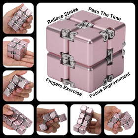 Lifidea Infinity Cube Pink on a desk for focused work sessions.