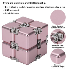 Lifidea Infinity Cube Pink held in hand to support concentration.