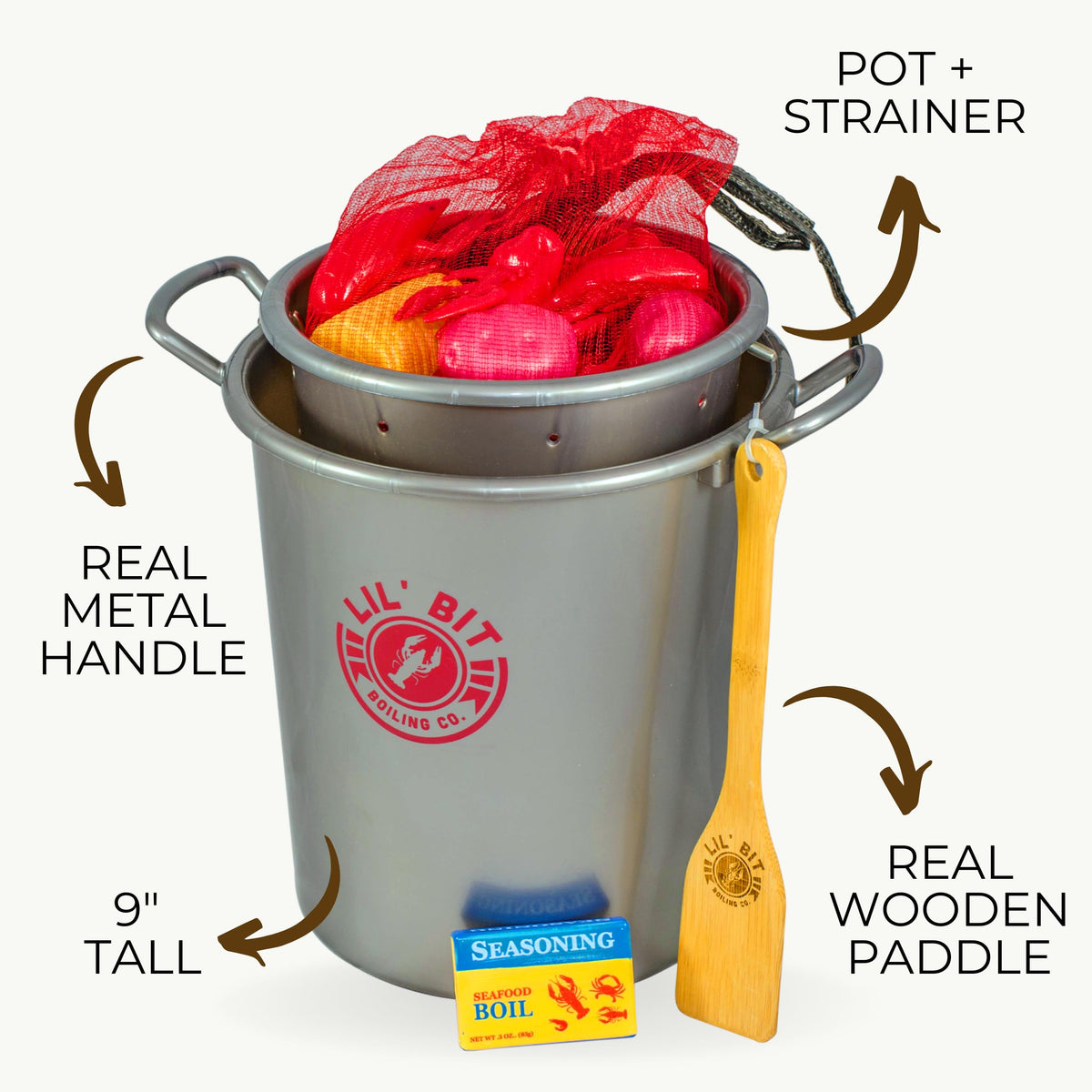 Lil' Bit Boiling Co. strainer enhances scoop-and-serve pretend play.