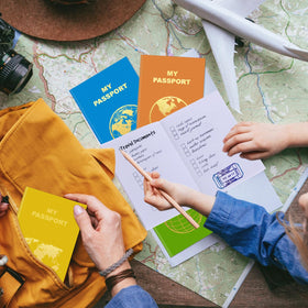 Lincia blank passport book orange cover supports travel journaling anywhere.
