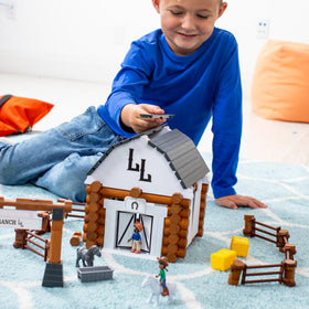 Lincoln Logs Big Sky Ranch doors and fence demonstrate movable elements for interactive ranch scenes.