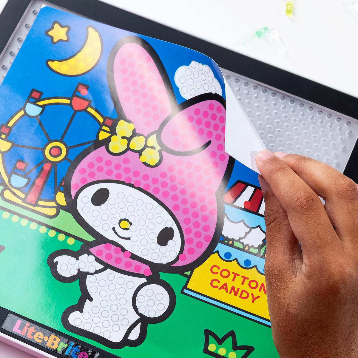 Lite-Brite auto-off after five minutes saves energy when idle