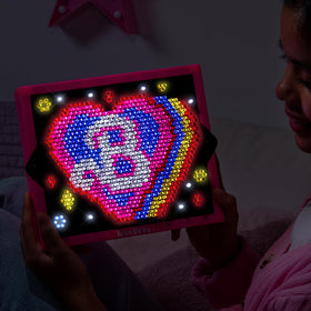 Lite Brite Barbie Edition four lighting modes offer versatile effects for mood variations.