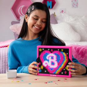 Lite Brite Barbie Edition includes 1,000 mini pegs for colorful, detailed scenes.