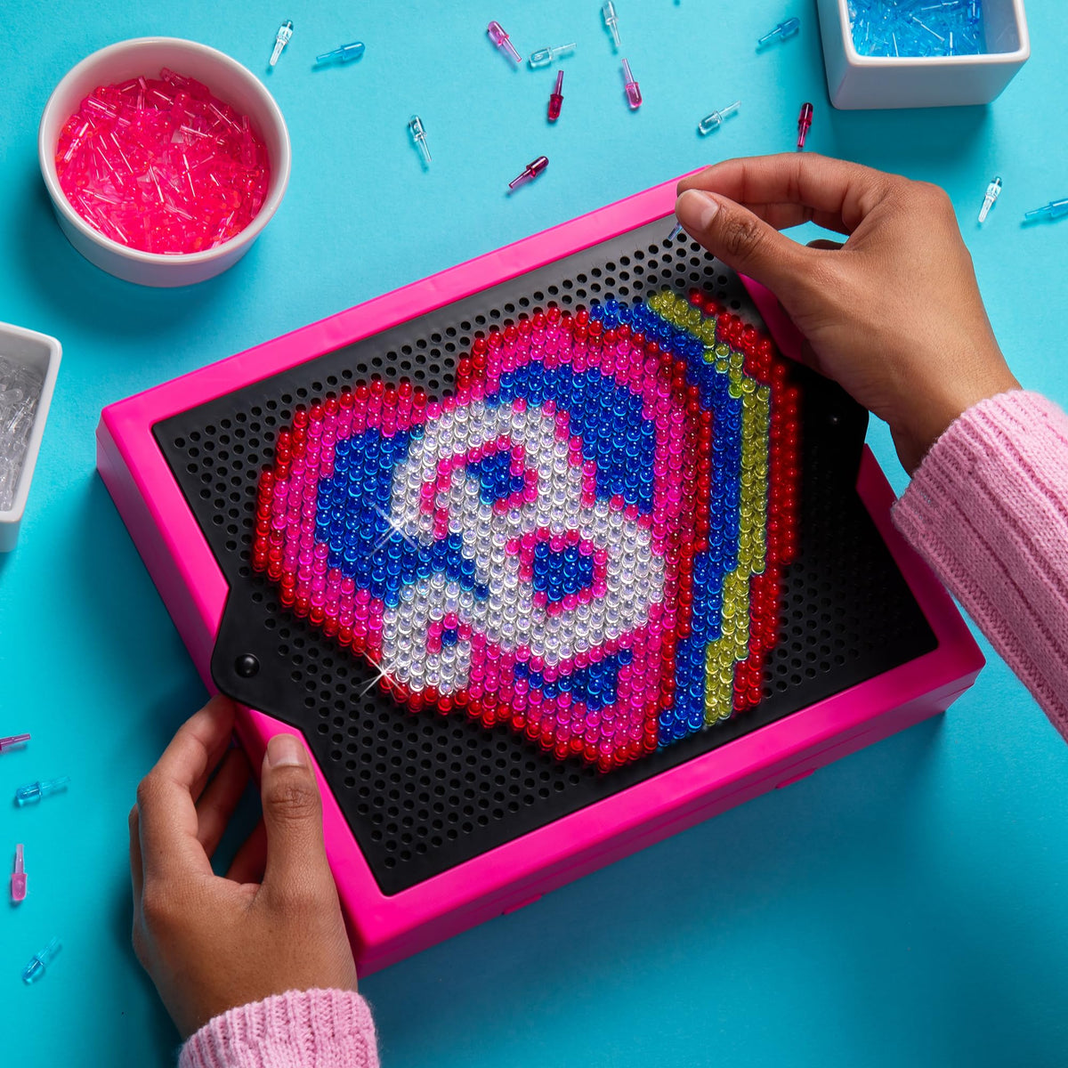 Lite Brite Barbie Edition snap-on grid keeps art bright and evenly lit.