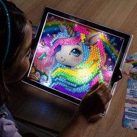 Lite-Brite Color Pop pull-out easel displays glowing artwork proudly