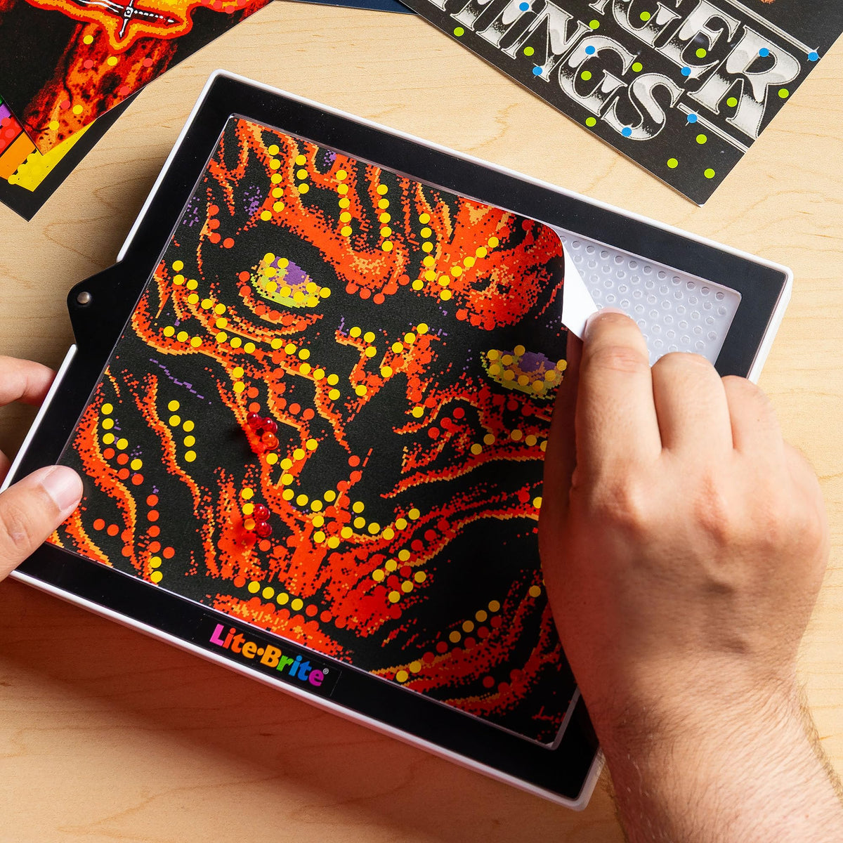 Lite-Brite Color POP! Hellfire moment glows for nostalgic crafts.