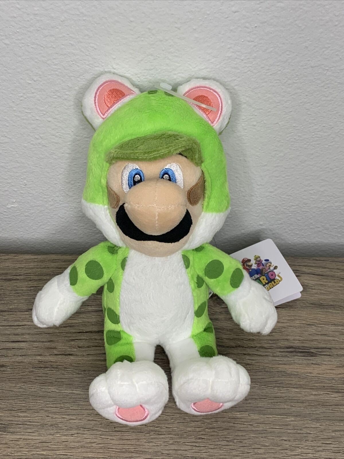 Little Buddy Luigi Cat Plush side view, vibrant colors for display.