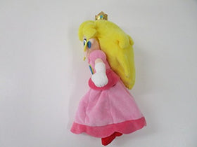 Little Buddy Peach plush back view, compact 10-inch display piece.