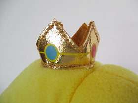 Little Buddy Peach plush face detail, expressive eyes and smile.
