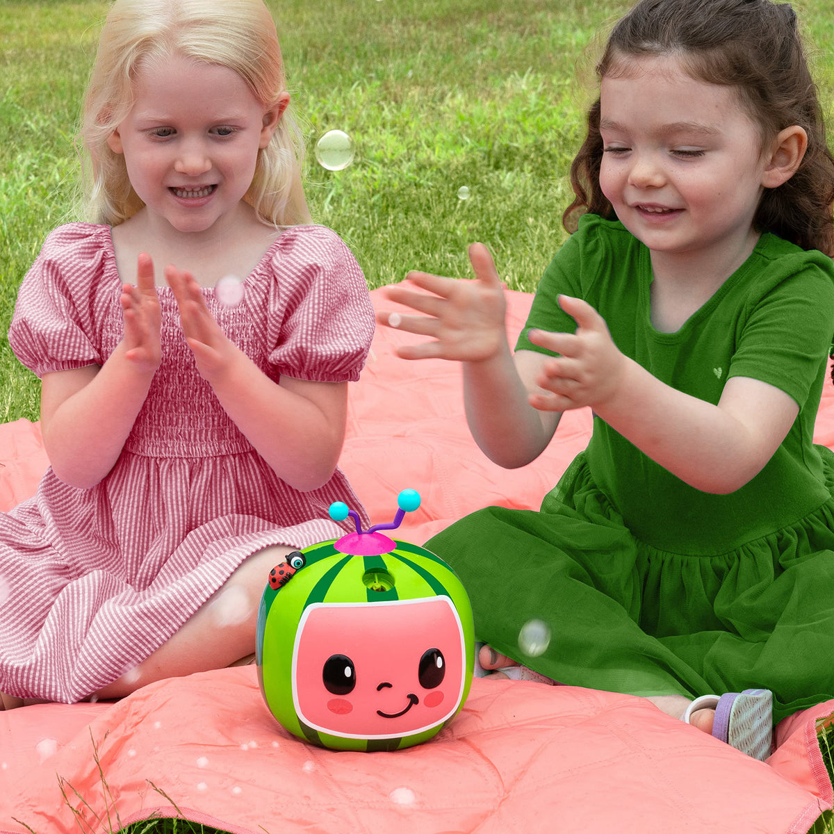 Little Kids CoComelon 20oz bubble solution bottle attached for longer play.