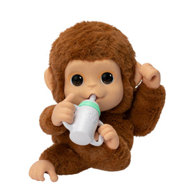 Little Live Pets Mango baby monkey with bottle promotes nurturing play and bonding
