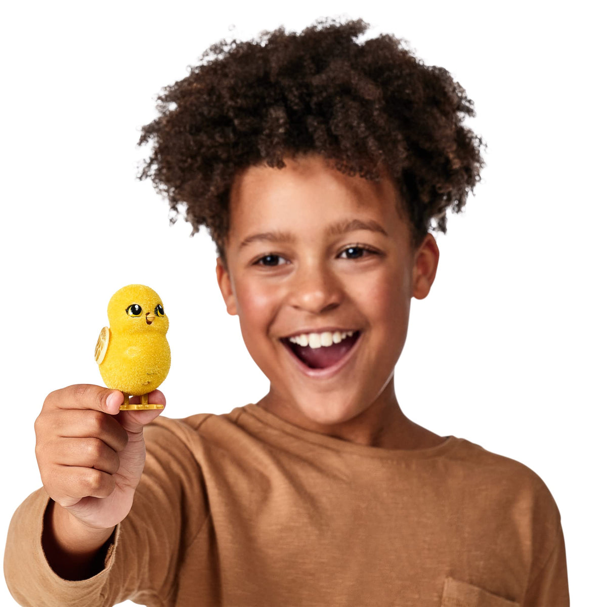 Little Live Pets Surprise Chick sings after gentle petting.